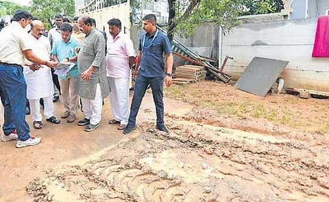 Chief Minister Basavaraj Bommai inspects rain damage at Mahadevapura zone in Bengaluru on Thursday. Local MLA Aravinda Limbavali is also seen | Express