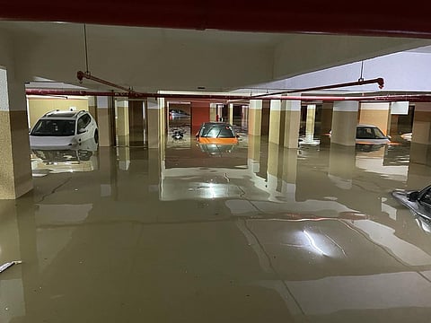 The flooding caused during recent rains at Bellandur's Sterling Ascentia has wrecked the Water Treatment Plant, STP and ruined 29 cars. (Photo | Special Arrangement)