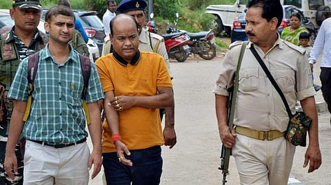Pankaj Mishra (centre), the MLA representative of Jharkhand Chief Minister Hemant Soren. (File Photo | PTI)