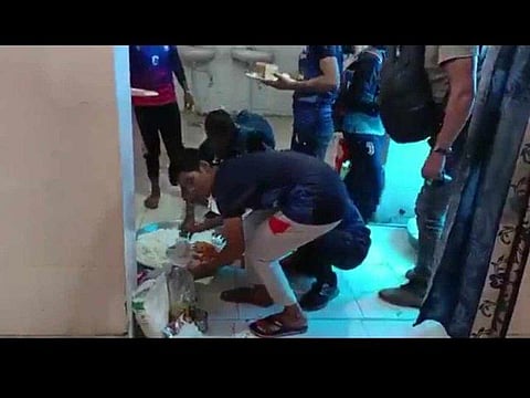 A screengrab shows sportspersons in Uttar pradesh being served food stored inside a toilet.
