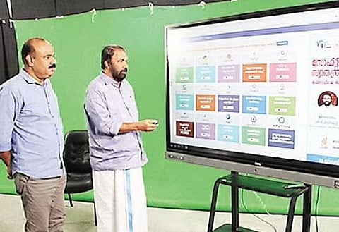 Minister for General Education V Sivankutty inaugurating the Software Freedom Day website. KITE CEO Anvar Sadath is also seen