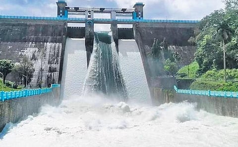 Water gushes out through the collapsed shutter (centre) of the Parambikulam dam on Wednesday | Express