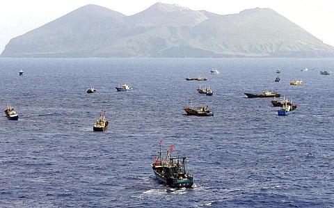 Foreign vessels, some of them have Chinese flags, fish near Torishima, Japan, on Oct. 31, 2014 (File Photo | AP)