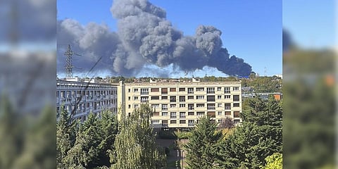 A billowing column smoke towered over Paris on Sunday from a warehouse blaze at a massive produce market that supplies the French capital and surrounding region with its fresh food. (Photo | AP)