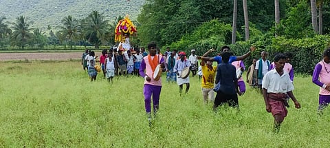 Residents of Settipatti in Tiruchy district traversing through farmlands to reach the cremation ground some 2 km away | Express