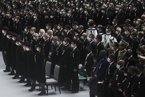 Guests attend the state funeral for Japan's former prime minister Shinzo Abe in the Nippon Budokan in Tokyo on September 27, 2022. (Photo | AFP)