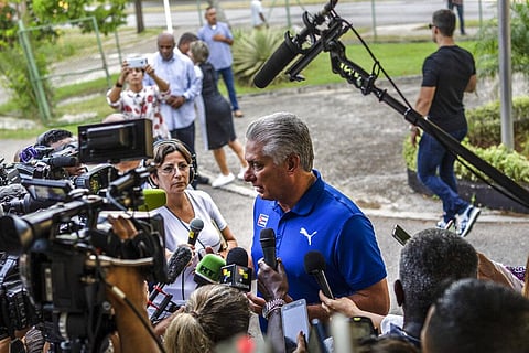 Cuba's President Miguel Diaz Canel speaks to the press after casting his vote at a polling station during the new Family Code referendum in Havana, Cuba, Sunday, Sept. 25, 2022.  (Photo | AP)