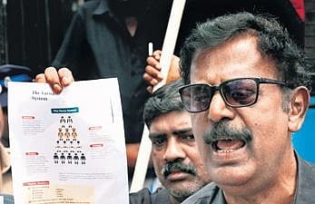 A member of Thanthai Periyar Dravidar Kazhagam shows the textbook’s content in Coimbatore | S Senbagapandiyan