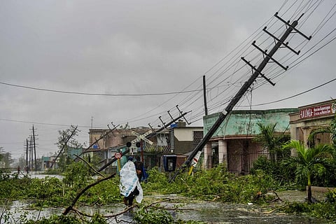 Fallen utility poles and fallen branches line a street after Hurricane Ian hit Pinar del Rio, Cuba. (Photo | AP)