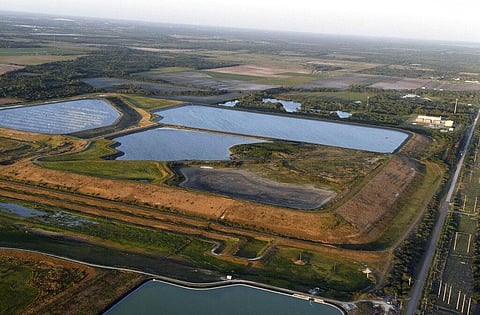 This aerial photo taken from an airplane shows a reservoir near the old Piney Point phosphate mine on April 3, 2021, in Bradenton, Fla.  (Photo | AP)