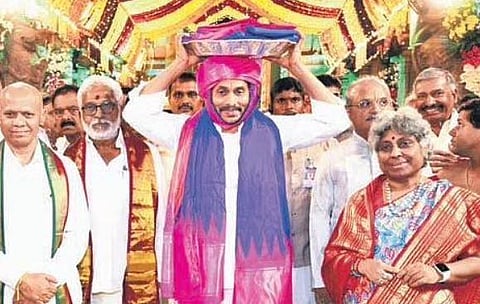Jagan presenting silk robes to Lord Venkateswara on day one of Brahmotsavams in Tirumala | Express