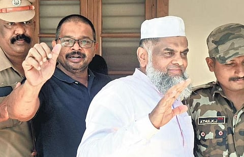 PFI's Abdul Sattar (right), the state general secretary of the unit, seen with another leader in the NIA court in Kochi on 23 September 2022. (Photo | A Sanesh, EPS)