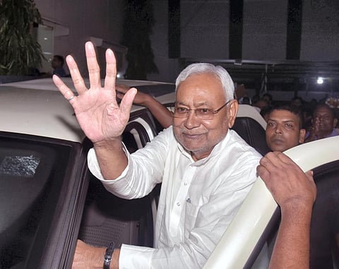 Bihar Chief Minister Nitish Kumar waves to supporters after Janata Dal (United) National Executive Meeting, in Patna, Saturday, Sept 3, 2022. (Photo | PTI)