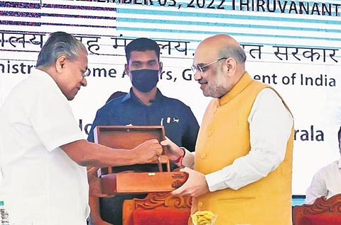 Chief Minister Pinarayi Vijayan presenting a memento to Union Home Minister Amit Shah during the Southern Zonal Council meet at Kovalam | Vincent Pulickal