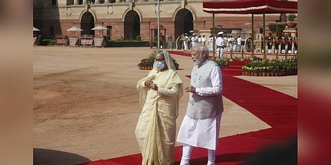 Prime Minister Narendra Modi shakes hand with  Bangladesh Prime Minister Sheikh Hasina during ceremonial reception at president house in New Delhi. (Photo | Shekhar Yadav, EPS)