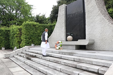 Rajnath Singh paying tribute to Japan's defense personnel  who laid their lives  in the line of duty.