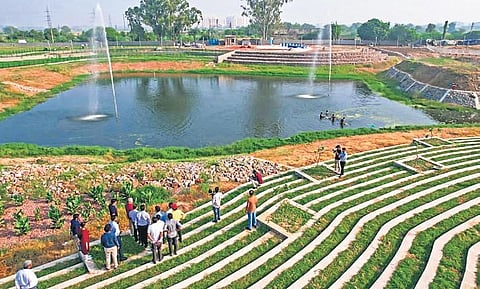 Deputy CM Manish Sisodia, along with officials, takes stock of the beautification work of Sannoth Lake being done under the ‘City of Lakes’ mission on Thursday | pti