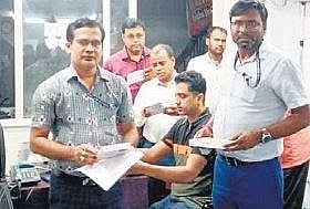 Officials during a raid at a medicine shop in Cuttack I Express