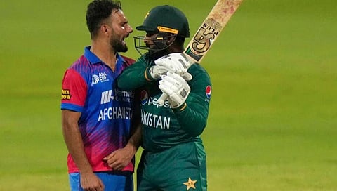 Pakistan's Asif Ali and Afghanistan bowler Fareed Ahmed