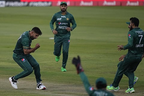 Pakistan's Haris Rauf (L) celebrates the dismissal of Afghanistan's Rahmanullah Gurbaz during T20 cricket match of Asia Cup in Sharjah on Wednesday. (Photo | PTI)