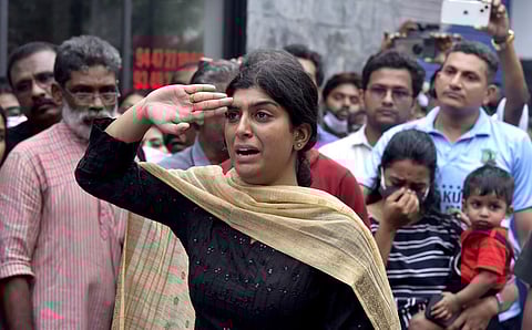 Here is a compilation of images that tell powerful stories, shot by our lensmen across the country, from over the course of the year past. Pictured here: Lt Gopichandra gives the final salute to her husband Captain Nirmal Shivarajan who died in the Madhya Pradesh flash floods, in Kochi. (Photo | A Sanesh, EPS)