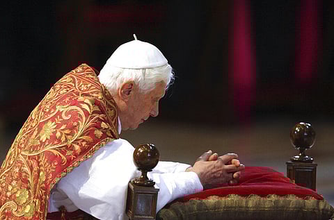 Pope Benedict XVI kneels during a service in St. Peter's Basilica at the Vatican on April 2, 2010. (Photo | AP)