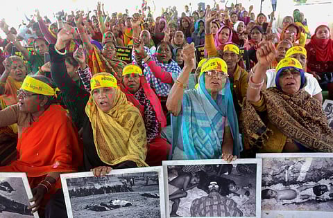 Survivors of 1984 Bhopal gas tragedy stage a protest demanding proper additional compensation, in Bhopal. (Photo | PTI)