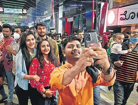 Revellers take a selfie on Brigade Road to usher in the New Year in Bengaluru  on Saturday | Shashidhar Byrappa