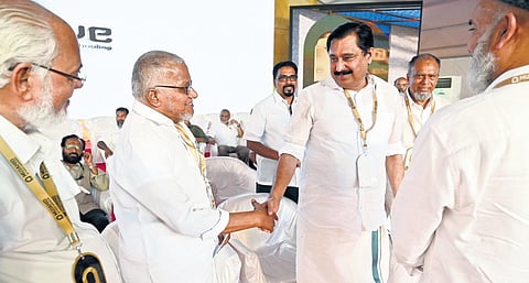 KNM president T P Abdulla Koya Madani sharing a light moment with Minister V Abdurahiman at the Mujahid conference in Kozhikode on Saturday | E Gokul