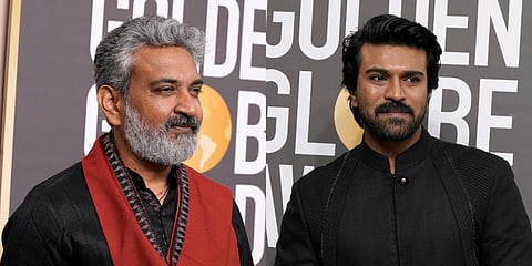 Director SS Rajamouli and actor Ram Charan (Photo | AP)