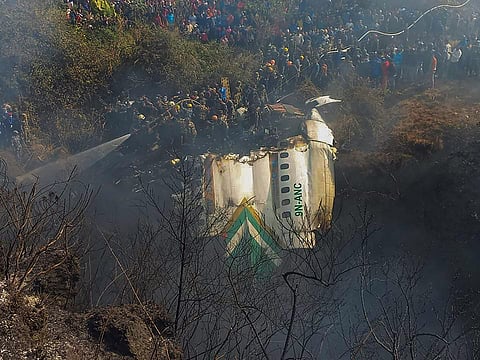 Rescue operation underway after a Yeti Airlines' passenger plane with 72 people onboard crashed into a gorge while landing at the Pokhara airport. (Photo | PTI)