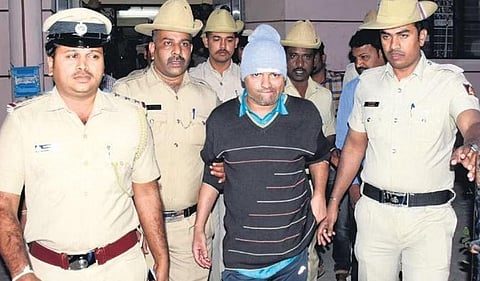 Police bring ‘Santro’ Ravi to produce him before a judge in Mysuru on Saturday| Udayashankar