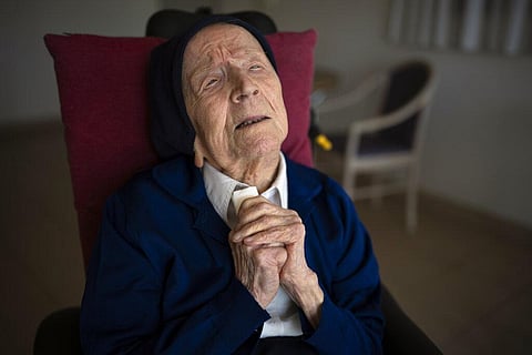 Sister Andre poses for a portrait at the Sainte Catherine Laboure care home in Toulon, southern France. (Photo | AP)