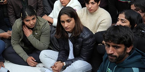 Indian wrestler Vinesh Phogat reacts during a press conference regarding wrestlers' protest against the Wrestling Federation of India (WFI), in New Delhi. (Photo | PTI)