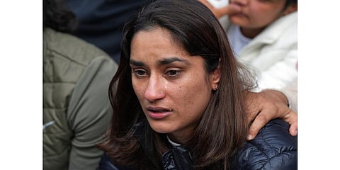Indian wrestler Vinesh Phogat reacts during a press conference regarding wrestlers' protest against the Wrestling Federation of India (WFI), in New Delhi, Jan 18, 2023. (Photo | PTI)