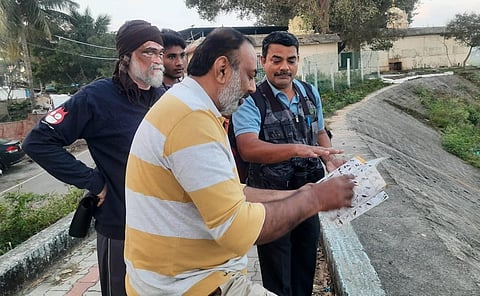 A part of the group engaged in bird watching at Korattur lake on Tuesday morning. (Photo | Express)
