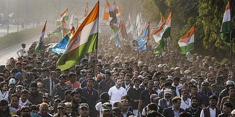 Congress leader Rahul Gandhi with party leaders and supporters during the Bharat Jodo Yatra. (Photo | PTI)