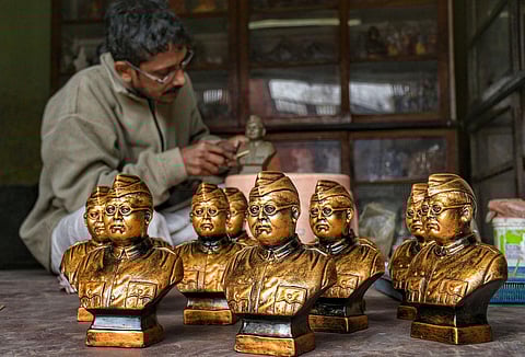 An artist makes busts of Netaji Subhash Chandra Bose for his upcoming birthday. (Photo | PTI)