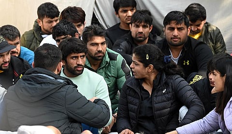 Wrestler Bajrang Punia, Sakshi malik and others during a protest against Wrestling Federation President Brijbhushan Sharan Singh and other officials in New Delhi. (Photo | Shekhar Yadav, EPS)