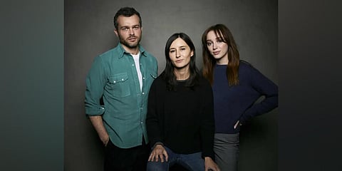 Alden Ehrenreich, from left, director Chloe Domont, and Phoebe Dynevor pose promote the film 'Fair Play' at the Sundance Film Festival. (Photo | AP)