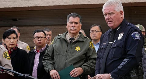 Los Angeles County Sheriff Robert Luna, center, and Monterey Park Chief of Police Scott Wiese, far right, brief the media outside the Civic Center in Monterey Park. (Photo | AP)