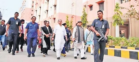 ​  Parliamentary committee members at the 2BHK dignity housing project  ​