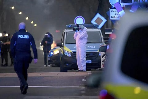 Police and forensic teams work at a level crossing near Brokstedt station in Brockstedt, Germany, Wednesday, Jan. 25, 2023. (Photo | AP)