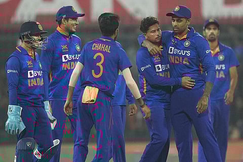 Indian players celebrate the wicket of New Zealand's Henry Nicholls during the third one-day international cricket match in Indore, Jan. 24, 2023. (Photo | AP)