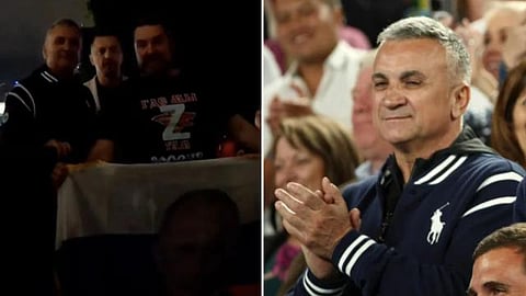 A video posted to a pro-Russian Australian YouTube account showed Djokovic's father Srdjan posing with a man holding the Putin flag. (YouTube grap/ AP Photo)