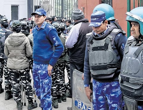 Police personnel gaurd the gate of Jamia Milia Islamia University  | shekhar yadav