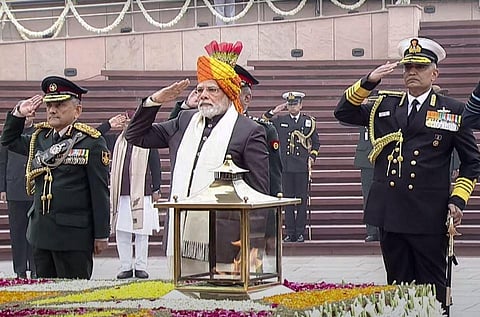PM Modi with Chief of Defence Staff General Anil Chauhan and Chief of Naval Staff Admiral R Hari Kumar pays homage at National War Memorial on the 74th Republic Day. (Photo | PTI)