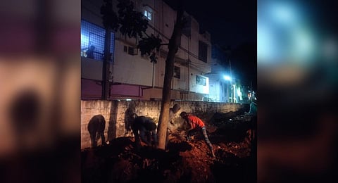 The first tree in connection with the Bengaluru Suburban Rail Project is being transplanted at Yelahanka on Wednesday. (Photo | EPS)