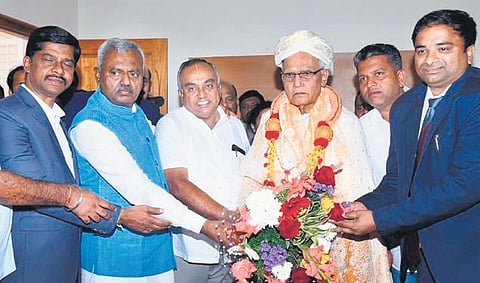 Mysuru district minister ST Somashekhar felicitates novelist SL Bhyrappa in Mysuru on Thursday | Udayashankar S