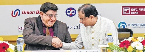 Karthik Kumar Raina, former CEO of Dabur Foods & Excelci, shares a light moment with IIM-Tiruchy director Pawan Kumar Singh at ‘Dhruva’ on Friday | MK Ashok Kumar